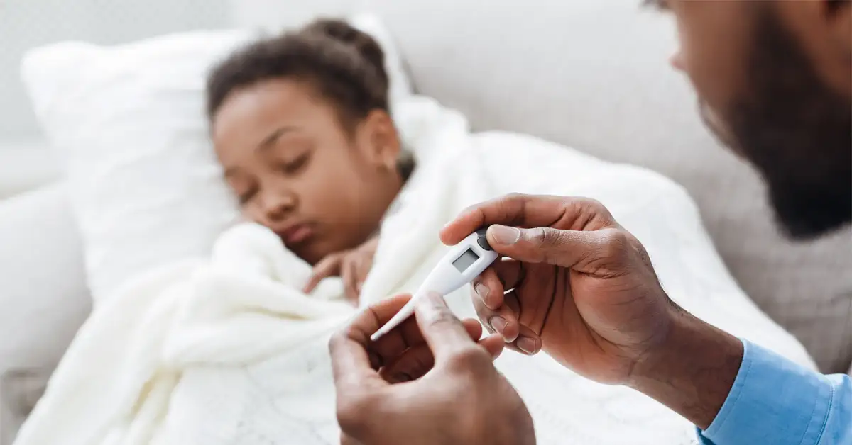 happy kids with pinwheel having fun at park